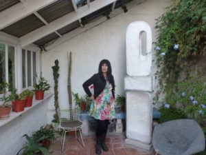 Anna Chen in Barbara Hepworth's garden conservatory. Photo Jan Jefferies